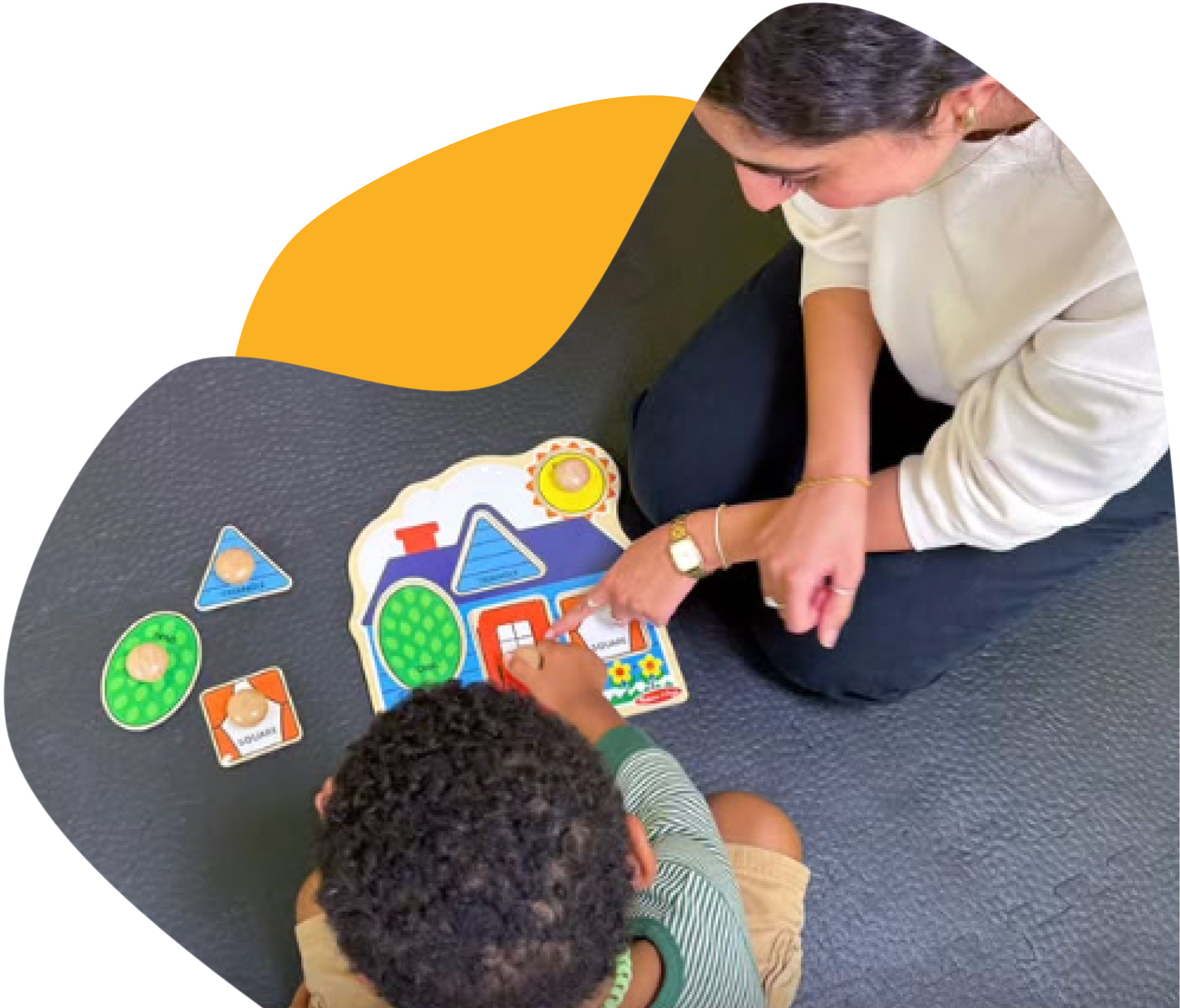 Therapist working with child